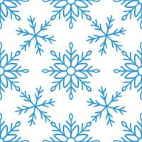 Winter seamless pattern with frosty blue snowflakes shimmering ice crystals and delicate winter branches for a magical winter look vector