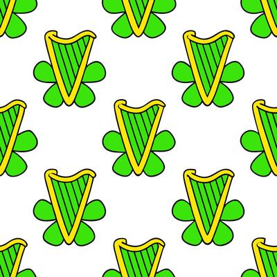 Whimsical Irish harps and clovers seamless tile pattern with vibrant green accents