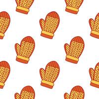 Cozy knitted mittens seamless tile pattern with autumn colors and warm textures vector