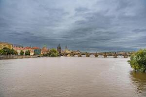 Flood in Prague. View of Charles Bridge over the flooding river Vltava, Prague. High quality photo