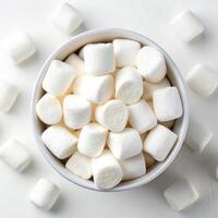 Top View of White Marshmallows in a Bowl photo