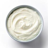 Top View of Creamy Yogurt in a Bowl on a White Background photo