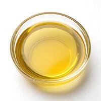 Top View of Golden Cooking Oil in a Glass Bowl on a White Background photo