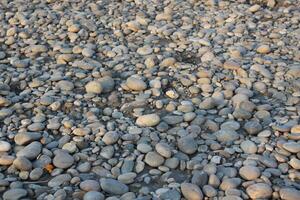 A large pile of rocks on the ground photo