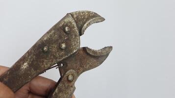 photo of a rusty looking locking pliers
