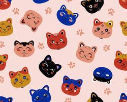 Cute cats seamless pattern. The animals head is in a flat style. Suitable for printing on paper vector