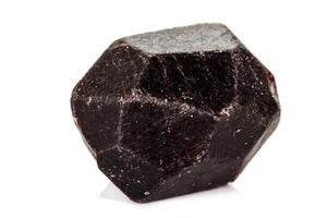 macro mineral stone Garnet, on a white background close up photo