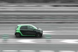 car on the highway in motion with a blurred photo
