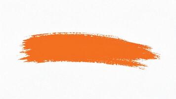 Solid orange brush stroke with smooth finish and sharp edges. photo