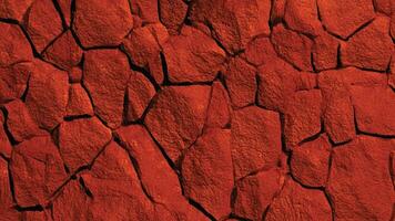 Cracked red stone wall with fragmented texture and rough sedimentary layers, highlighting geological beauty perfect for backgrounds, design, and architectural patterns. photo