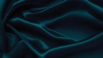 Velvet dark green fabric texture with elegant curves and shadows, creating a refined and luxurious textile background for artistic and design purposes. photo