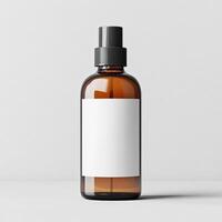 Stylish amber spray bottle with a blank label for custom branding or product display. photo