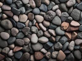 Textured stones create an abstract natural background in calm, muted tones photo