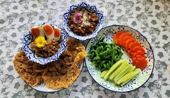 Vibrant Vegetable Dip with Chilli Paste and Fresh Sides photo