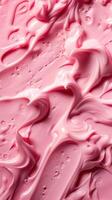 Smooth pink cream texture swirls, glossy appearance. Beauty and skincare concept photo