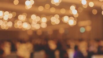 An image of a crowded room with lights video