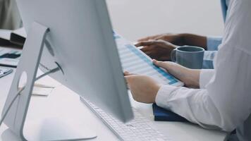 A person is using a tablet computer at a desk video