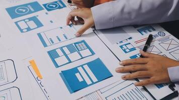 A person is working on a design project with blueprints video