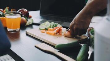 A person is cutting vegetables on a cutting board video