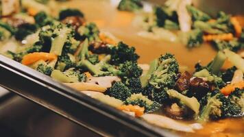 A pan filled with broccoli and carrots video