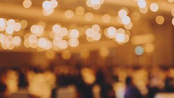 An image of a crowded room with lights video