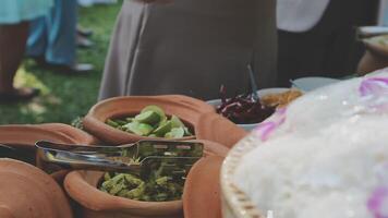 A buffet table with food and utensils video