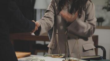 A woman shaking hands with a man in a suit video