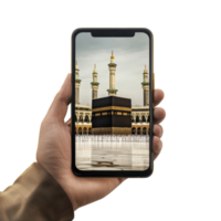 A hand holds a phone displaying the Kaaba in Mecca png