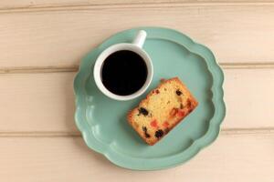 Top View Fruit Cake Slice and Coffee photo