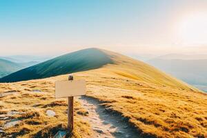 Scenic Mountain Landscape at Sunset with Empty Wooden Sign on Trail in Serenity photo