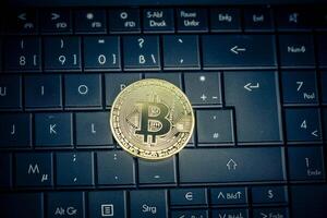 Bitcoin on a computer keyboard photo