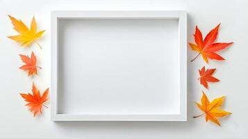 Blank Frame Surrounded by Colorful Autumn Leaves on White Background photo