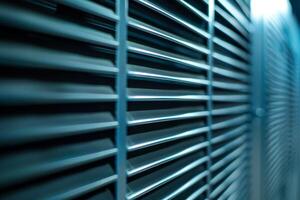 Close up view of metal ventilation grille creating abstract industrial background photo