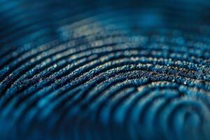 Blue glitter fabric forming concentric circles with shallow depth of field photo