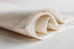 Close up of baking paper rolls forming an elegant abstract design photo