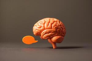 Human brain generating ideas and expressing thoughts through speech bubble photo