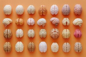 Multiple brains showing different colors and orientations on orange background photo