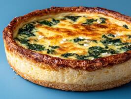 Delicious spinach and cheese quiche with a flaky crust photo
