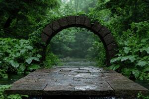 Stone archway leading to a tranquil stream in a lush forest photo
