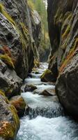 Water flowing through a narrow canyon photo