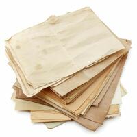 Stack of folded and stained old papers on white background photo
