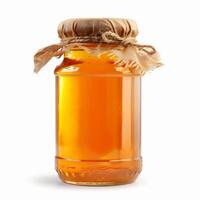 Glass jar full of honey covered with rustic cloth and tied with string on white background photo