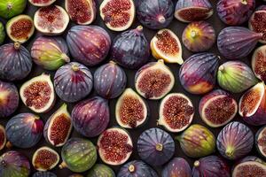 Fresh figs whole and halved creating vibrant background photo