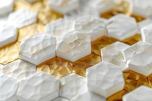 White and gold hexagonal ceramic tiles creating textured geometric pattern photo