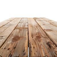 Perspective view of distressed wooden planks creating rustic tabletop on white background photo