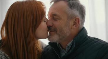 Intimate moment between elderly caucasian couple expressing love and connection photo