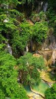 Aerial view of beautiful tropical waterfall in the lush jungle. video