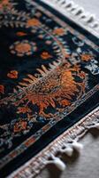 Ornate patterned rug in rich orange tones photo