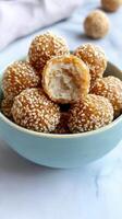 Delicious sesame balls with golden crust, perfect for snacking photo