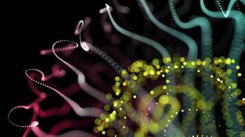 Yellow, Teal, and Red Abstract Glowing Particle Loops on Dark Background video